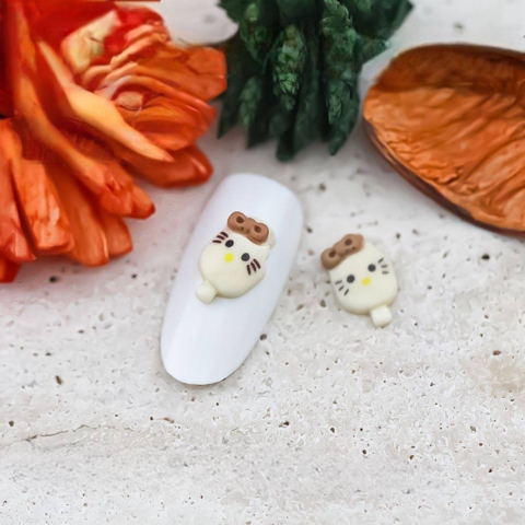 Шарми (фігурки) для нігтів К-628 Hello Kitty 9х11 мм (1 шт), молочно-коричневі